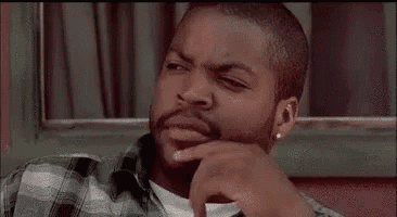 ice cube is sitting at a table with his hand on his chin and says `` bye , felisha . ''
