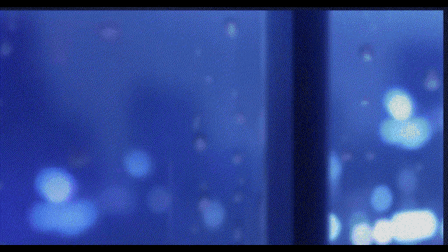 a blue background with a few white dots
