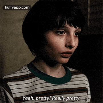 a close up of a person wearing a striped shirt and saying yeah pretty really pretty .