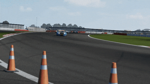 a video game shows cars racing around a track