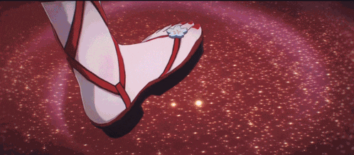 a girl in a red dress is surrounded by red fish in front of a sign that says the