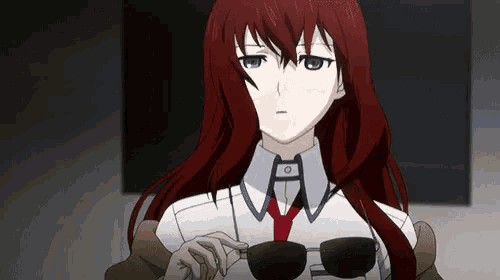 a girl with long red hair is wearing sunglasses and a red tie .