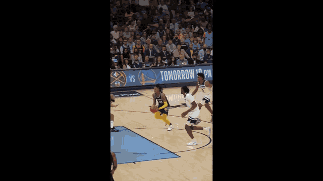 a basketball player with the number 12 on his back