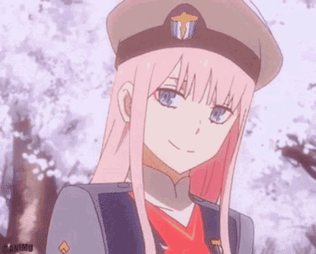 darling in the franxx zero two is wearing a hat and smiling .