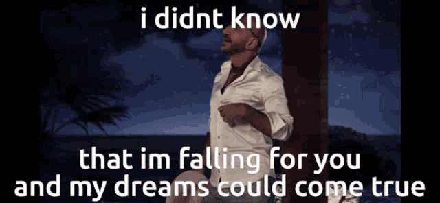 a man in a white shirt is standing in front of a palm tree and says i didnt know