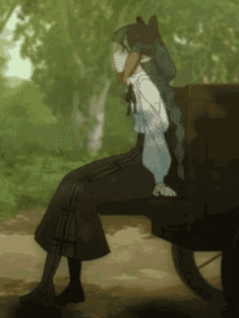 a person sitting on a bench with an umbrella in their hand