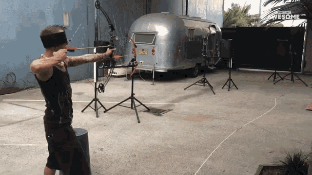 Shoot Arrow People Are Awesome GIF - Shoot Arrow People Are Awesome Blindfolded GIFs