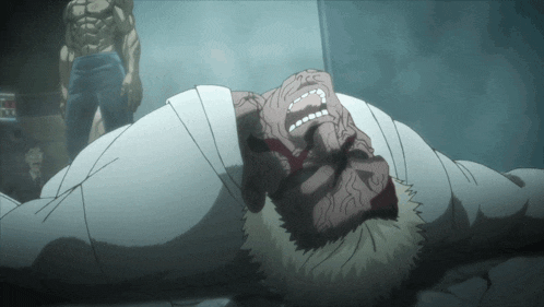 a man laying on the floor with his mouth open