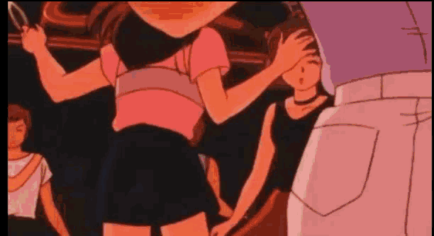 a girl in a pink shirt is standing next to another girl