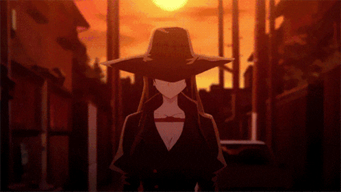 a woman with long hair wearing a black hat