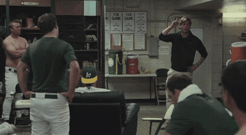 a group of baseball players standing in a locker room with the words that 's what losing sounds like