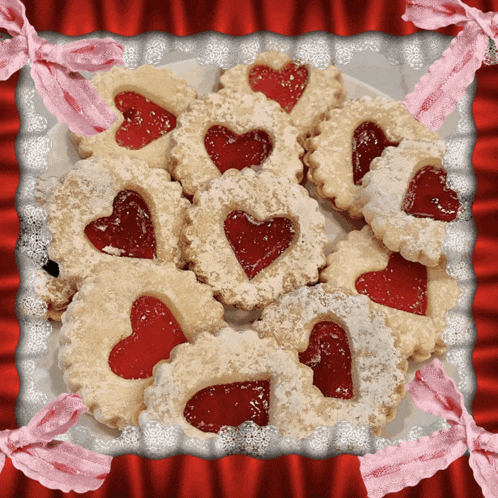 a plate of cookies with hearts in them