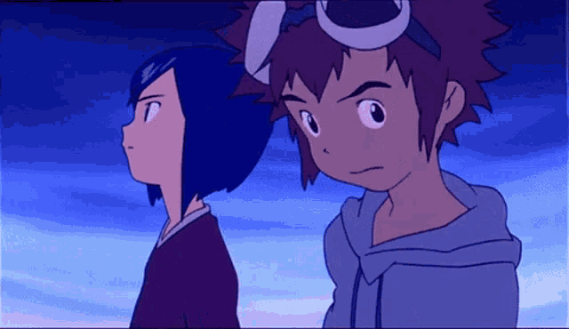 a boy and a girl are standing next to each other in a blue sky