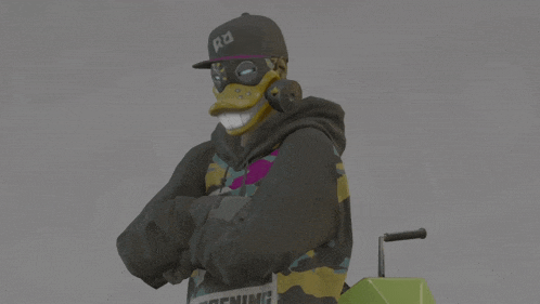 a man wearing a mask and a hat with the letter r on it stands with his arms crossed