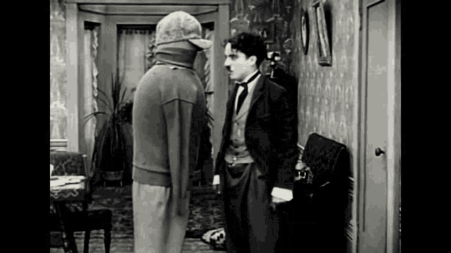Charlie Chaplin Talking GIF - Charlie Chaplin Talking Mad GIFs