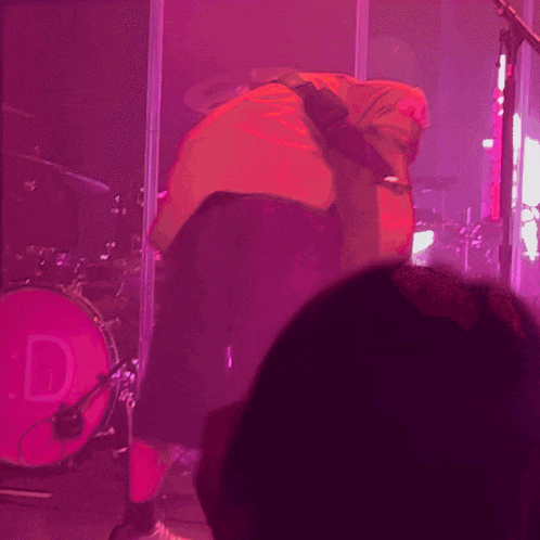 a drum with the letter d on it is being played
