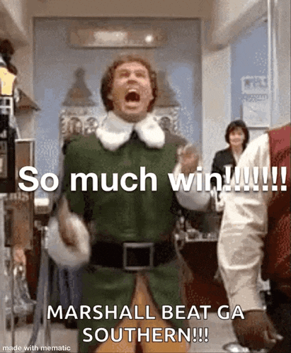 a man in a green elf costume is screaming in a room with the words `` so much win !!! ''