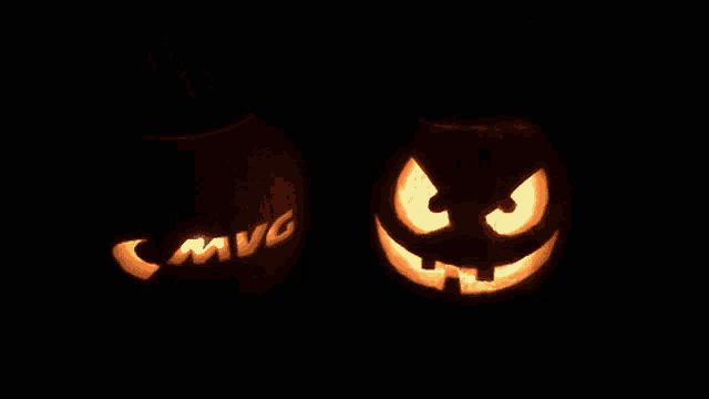 a carved pumpkin with the word mvg carved into it