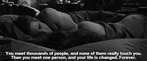 a black and white photo of a couple laying in bed with a quote that says you meet thousands of people