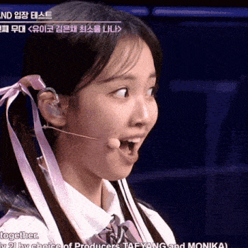 a close up of a girl wearing a microphone with the words together at the top