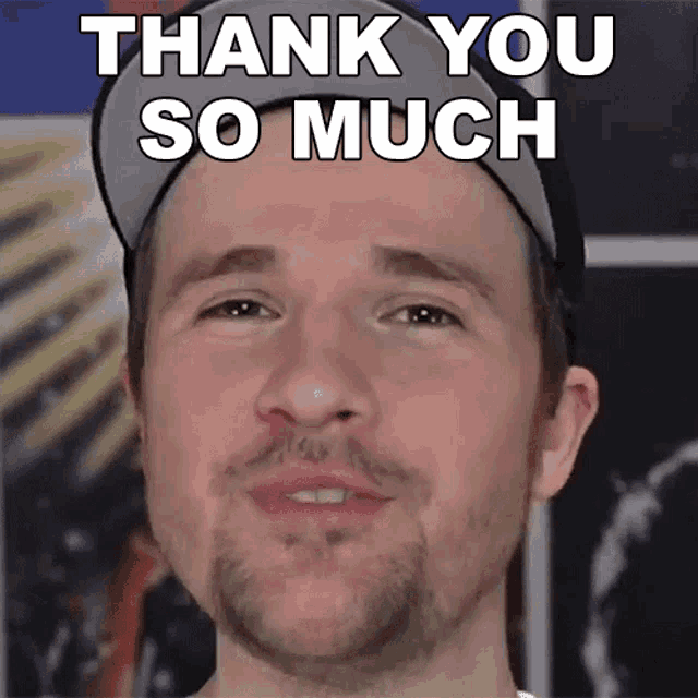 a man with a beard is wearing a hat and says thank you so much