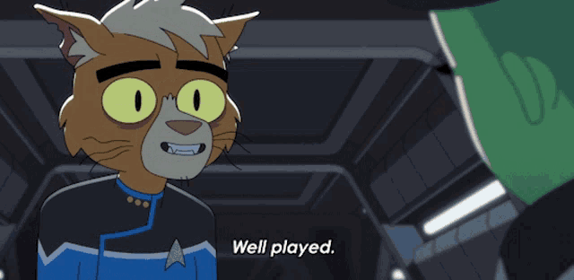 a cartoon cat says well played in front of a green cube