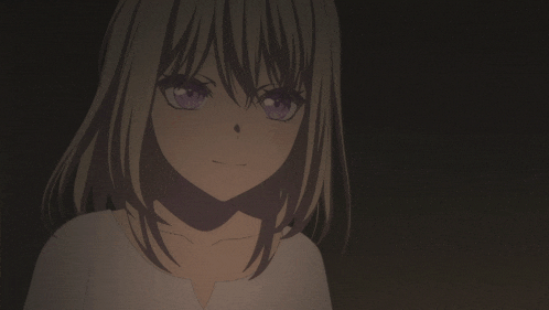 a girl with her eyes closed is pointing upwards