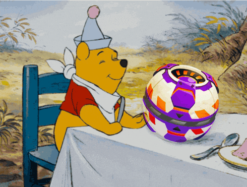 winnie the pooh is sitting at a table with a purple ball