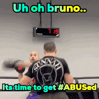 a picture of two men boxing with the caption " uh oh bruno "