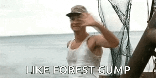 a man is waving from a boat in the ocean in a scene from the movie `` like forest gump '' .