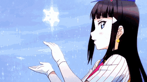 a girl with long black hair is holding a snowflake in her hands