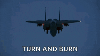 a fighter jet is flying through a blue sky with the words turn and burn written below it