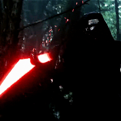 a close up of a red car with a white light
