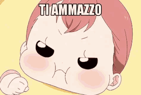 a cartoon baby is making an angry face with the words `` ti ammazzo '' written on it .