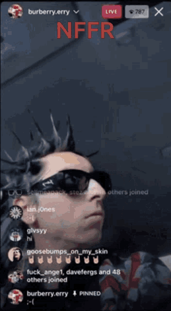 a screen shot of a man with a mohawk and sunglasses says nfr
