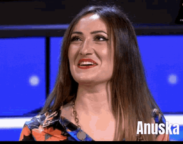 a woman with the name anuska on the bottom