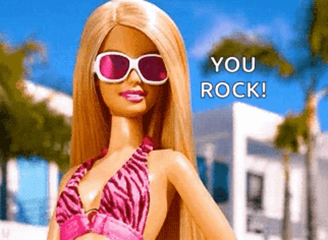 a barbie doll is wearing sunglasses and a bikini and says you rock