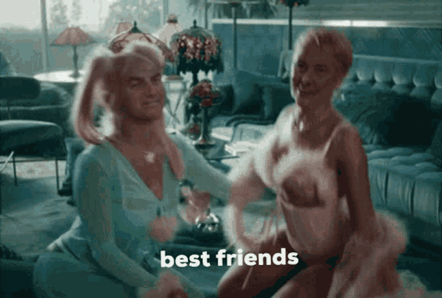two women are dancing in a living room with the words best friends written on the bottom