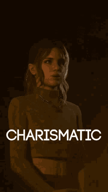 a woman in a green sweater with the word charismatic on it