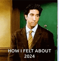 a man in a suit and tie is standing in front of a green door with the words `` how i felt about 2024 '' .