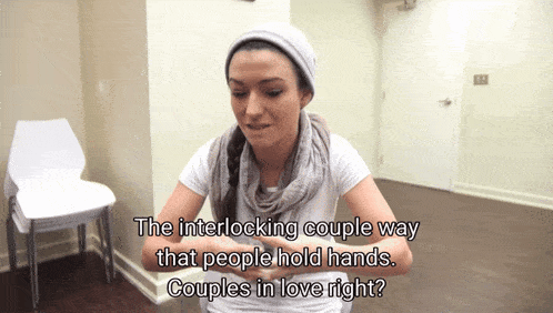the interlocking couple way that people hold hands couples in love right?