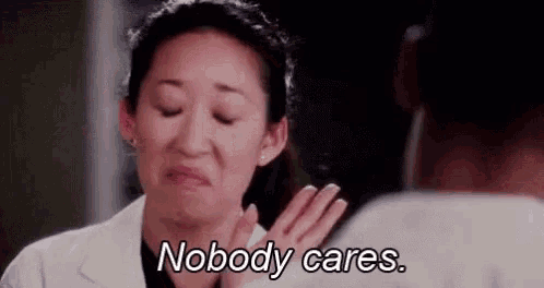 a woman is making a funny face and saying `` nobody cares '' .