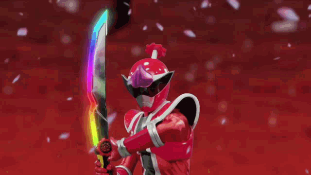 a cartoon character with a rainbow colored sword