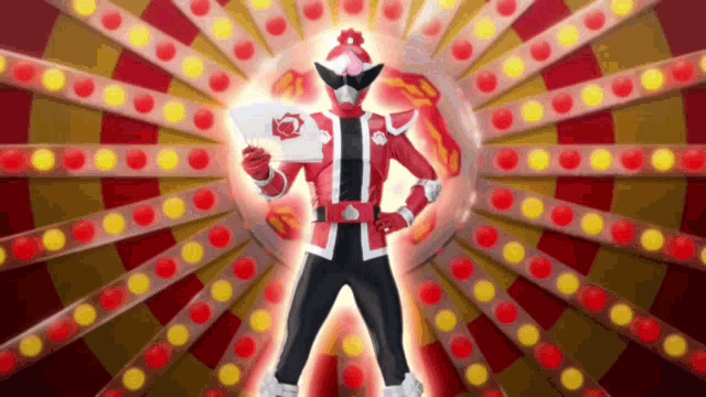 a man in a red and black costume is holding a fan