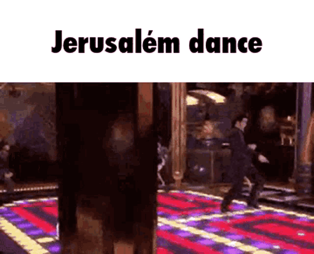 a man is dancing on a dance floor with the words jerusalem dance above him .