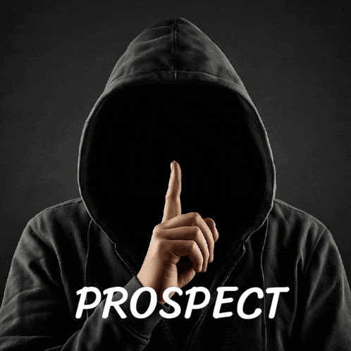 a man in a hooded sweatshirt holds his finger to his lips and the word prospect is below him
