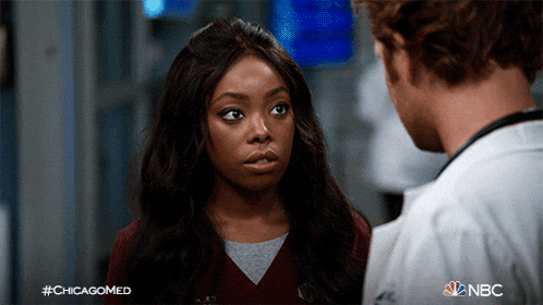 a man and a woman are looking at each other and the hashtag #chicagomed is on the bottom