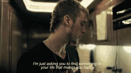 a man is standing in a kitchen with a quote that says " i 'm just asking you to find something in