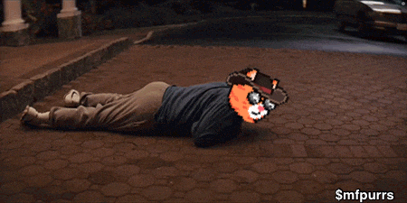 a man is laying on the ground in front of a white car with the words smpipurrs on the bottom right