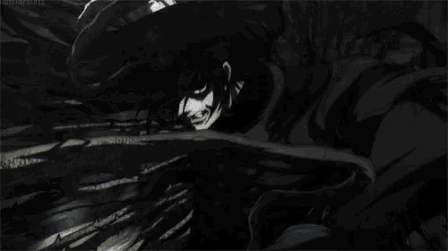 a man with red eyes is standing in the dark with a shadow of a person behind him .